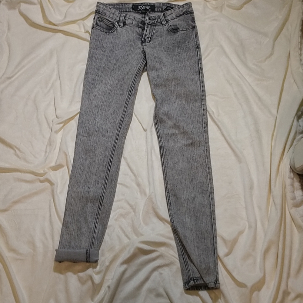 Grey acid wash mid rise skinny jean